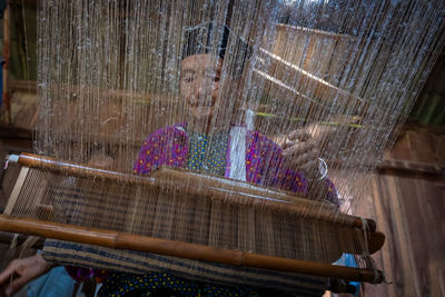 Woman working on wood