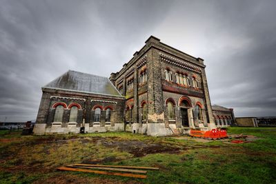 View of historical building against cloudy sky