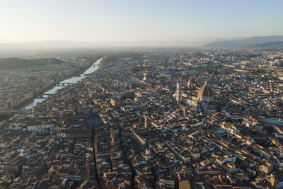 Aerial view of florence along the arno river and the old town from above, tuscany, italy,