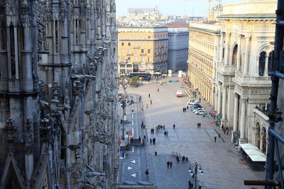 High angle view of road amidst buildings