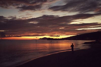 Scenic view of sea at sunset