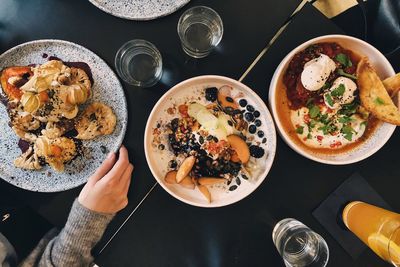 High angle view of person having food at table