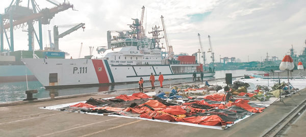 Panoramic view of harbor against sky