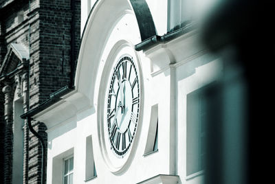 Low angle view of clock on building