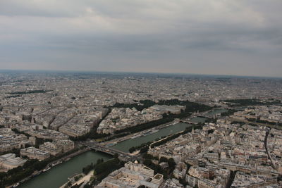 High angle view of buildings in city against sky