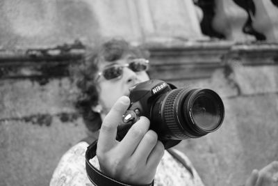 Man photographing with camera