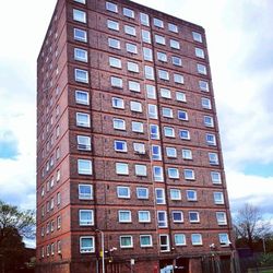 Low angle view of modern building against sky