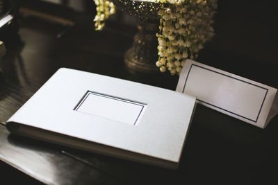 High angle view of open book on table