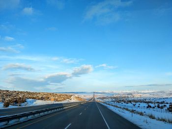 Road against sky during winter
