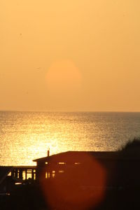 Scenic view of sunset over sea