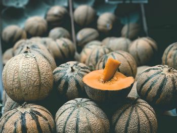 Muskmelons for sale at market stall