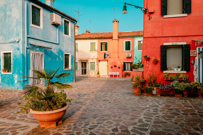 Burano square with characteristic houses colorful houses