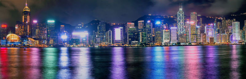 Illuminated buildings in city at night