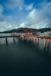 Bridge over river against sky