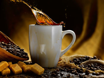 Close-up of coffee cup on table