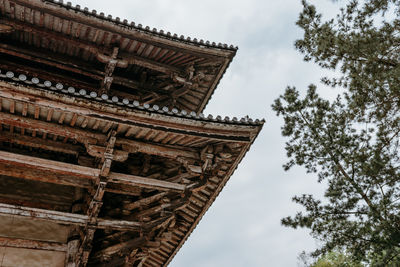 Low angle view of historic building against sky
