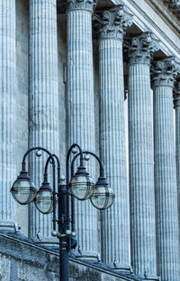 Low angle view of street light on building