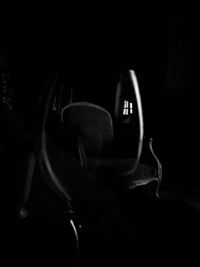 Close-up of vintage car against black background