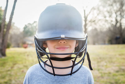 Portrait of a boy with baseball helmet