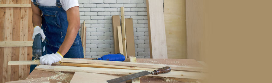 Woman working on wood at home