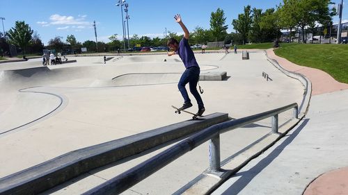 Full length of man skateboarding on skateboard