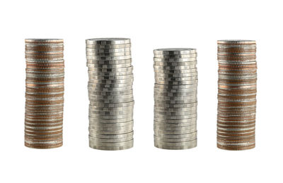 Close-up of coins on white background