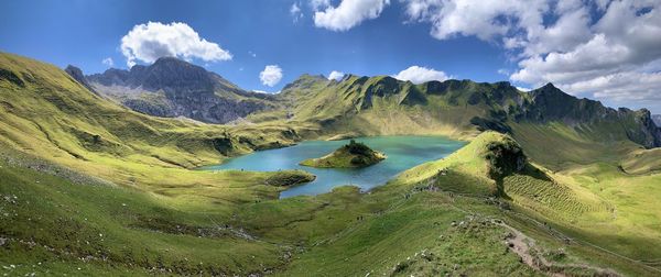 Panoramic view of landscape and mountains against sky