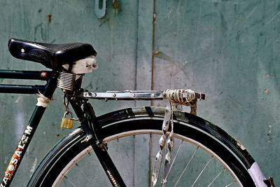 Close-up of bicycle on wall