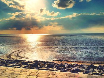 Scenic view of sea against sky during sunset