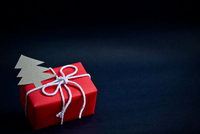 Close-up of red box against black background