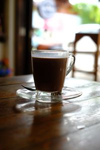 Close-up of coffee cup on table