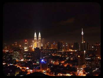 Illuminated cityscape at night