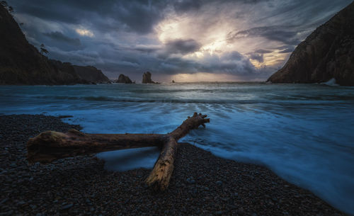 Scenic view of sea against sky during sunset