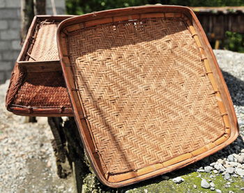 High angle view of wicker basket on field