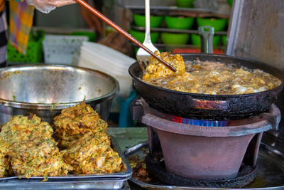 Close-up of meat in cooking pan