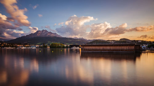 Scenic view of lake against sky during sunset with mountain in background
lucerne, pilatus, seebad