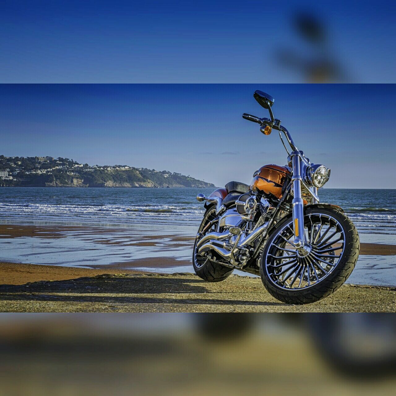 sea, bicycle, transportation, nature, motorcycle, sky, beach, stationary, sand, outdoors, beauty in nature, no people, clear sky, tranquility, scenics, water, horizon over water, vacations, day