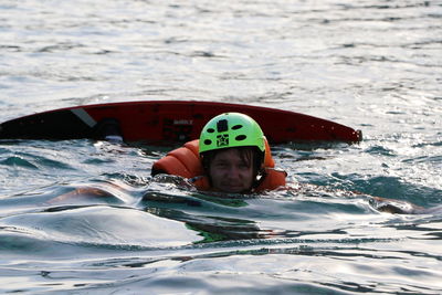 Portrait of young woman in swimming pool