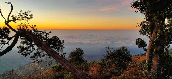 Scenic view of sea against sky at sunset