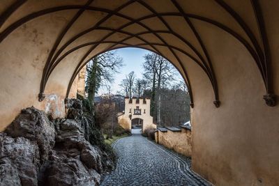 Buildings seen through arch window