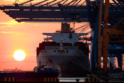 View of commercial dock at sunset