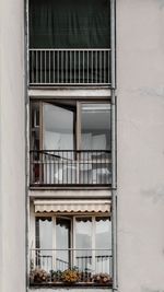 Low angle view of building seen through window