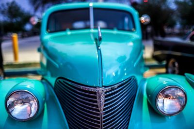 Close-up of blue vintage car