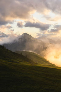 Scenic view of landscape against sky during sunset