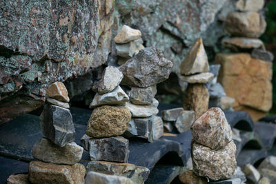 Stack of stones against stone wall