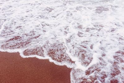 Close-up of wave on shore