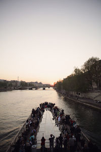 High angle view of crowd on river against sky