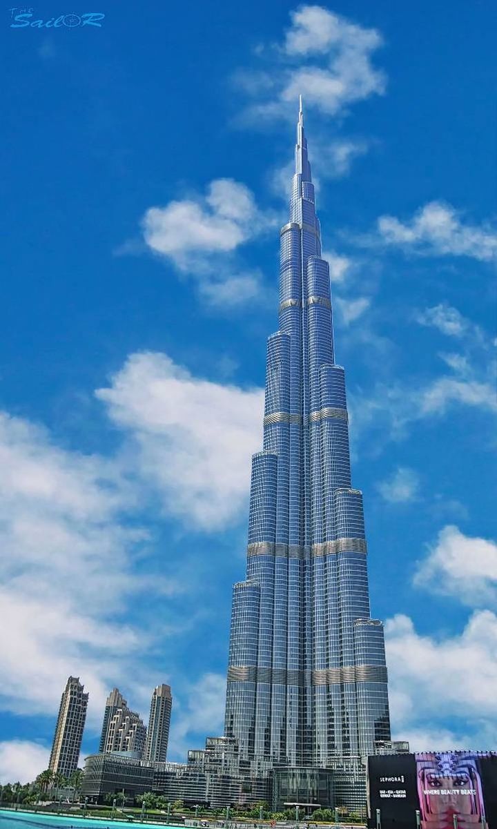 built structure, architecture, building exterior, sky, building, tall - high, city, office building exterior, skyscraper, cloud - sky, modern, tower, nature, day, travel destinations, no people, office, low angle view, travel, outdoors, cityscape, spire, financial district