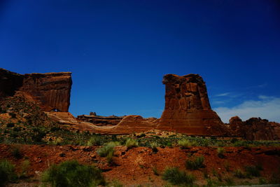 Scenic view of landscape against clear blue sky