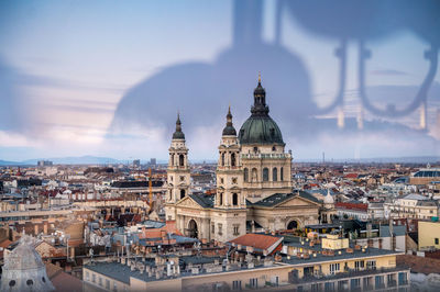 High angle view of buildings in city against sky